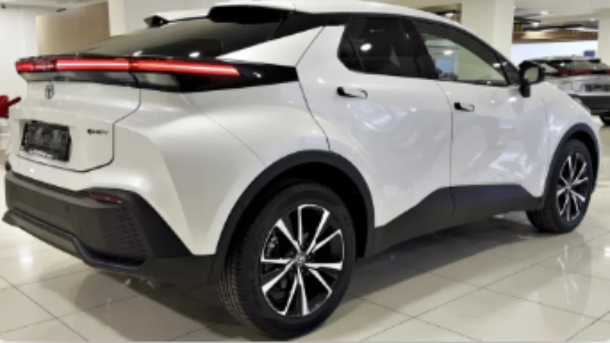 2026 Ferrari SF90 hybrid supercar with aggressive design and aerodynamic body showcased in studio lighting