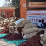 Dry red chilli bags at Hubballi APMC market as prices surge due to low arrivals