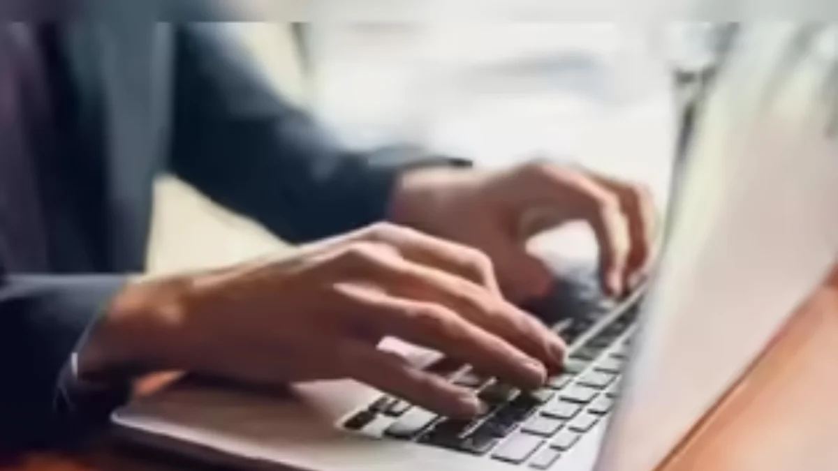 Student checking JEE Main 2026 result and scorecard on official NTA website on laptop