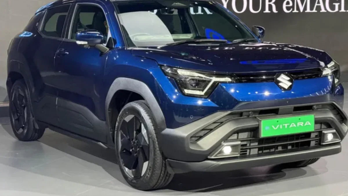 Maruti Suzuki e-Vitara electric SUV front profile view showcasing LED headlights and modern EV design in India launch event
