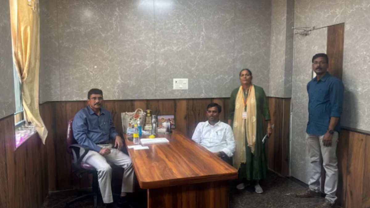 Karnataka BJP MLA Chandru Lamani being escorted by Lokayukta officials after being caught accepting a Rs 5 lakh bribe.