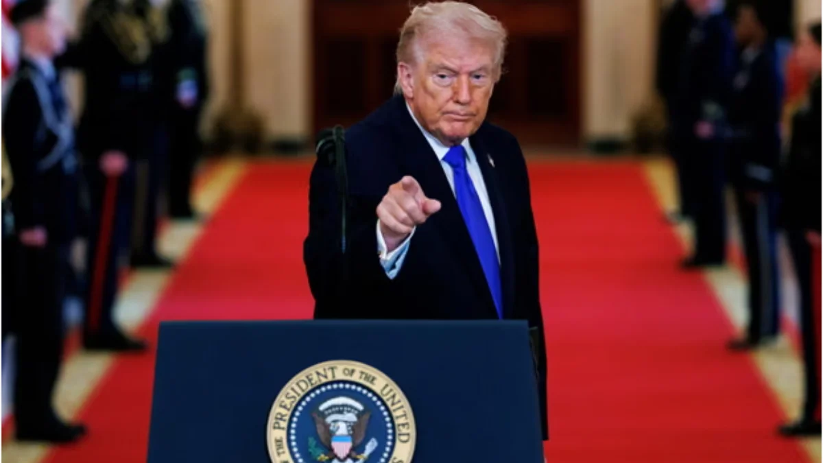 US President Donald Trump speaking at podium with US flag amid rising tensions over Iran nuclear talks