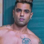 Mayank Pawar from MTV Splitsvilla 7 posing during a fitness event, remembered after his death at age 37