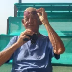 UK cricket fan watching Ranji Trophy final match at KSCA Rajnagar Stadium in Hubballi