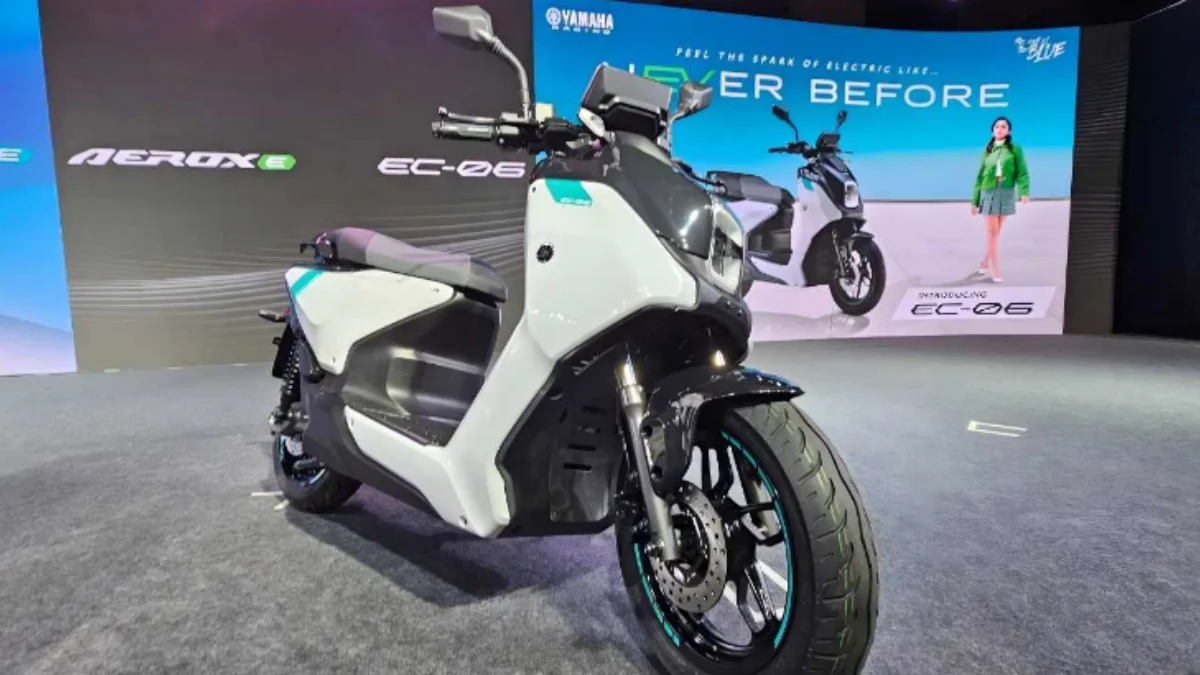 Yamaha EC-06 electric scooter 2026 model displayed with modern LED lights and digital dashboard in urban setting