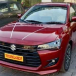 Maruti Suzuki Dzire front view on city road