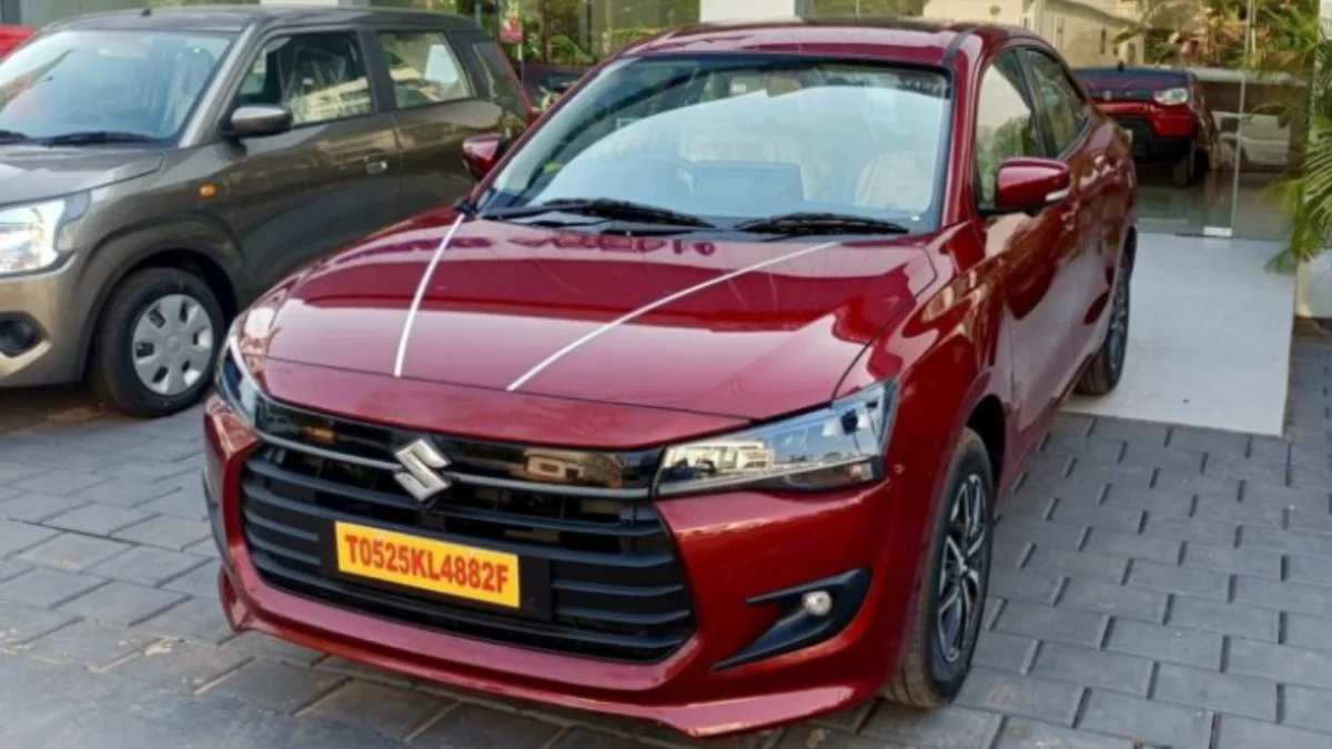 Maruti Suzuki Dzire front view on city road