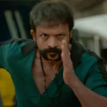 Jayasurya in a scene from Aadu 3 showing a serious expression during a dramatic moment