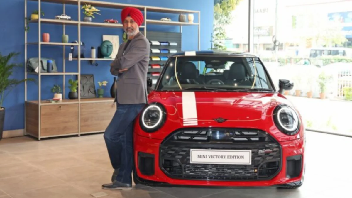 Mini Cooper S Victory Edition in red color with racing stripes parked outdoors