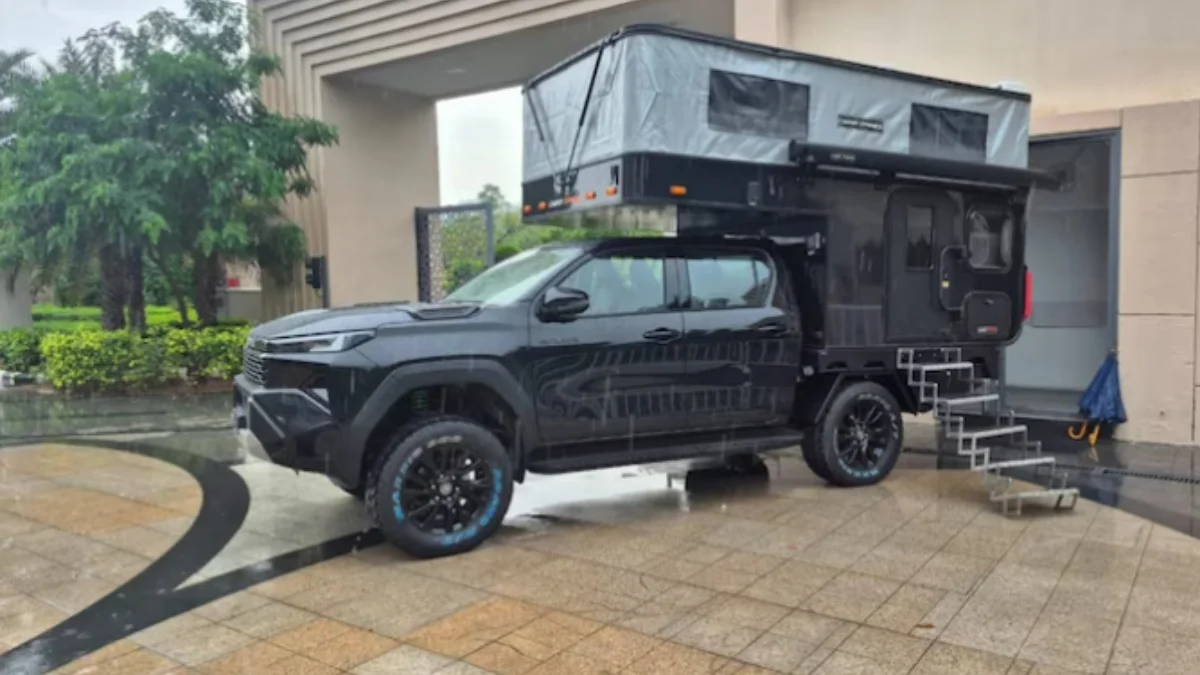 Toyota Hilux Camper pickup truck converted into a mobile home with camping and sleeping facilities
